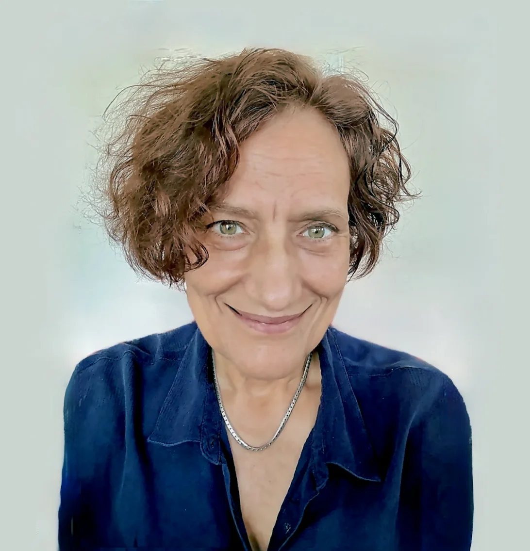 Val Fraser, founder of AdaptaWiZ, navy blue blouse